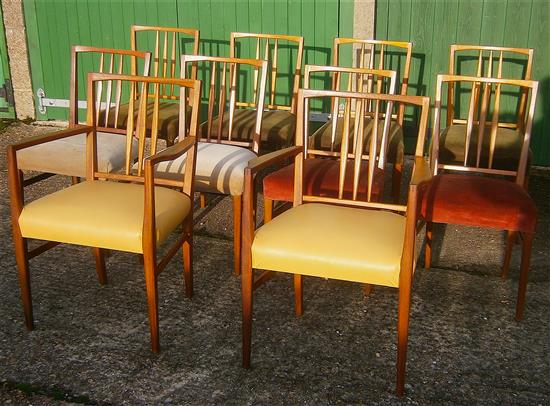 Gordon Russell, extending teak dining table with ten chairs including two carvers W.230cm